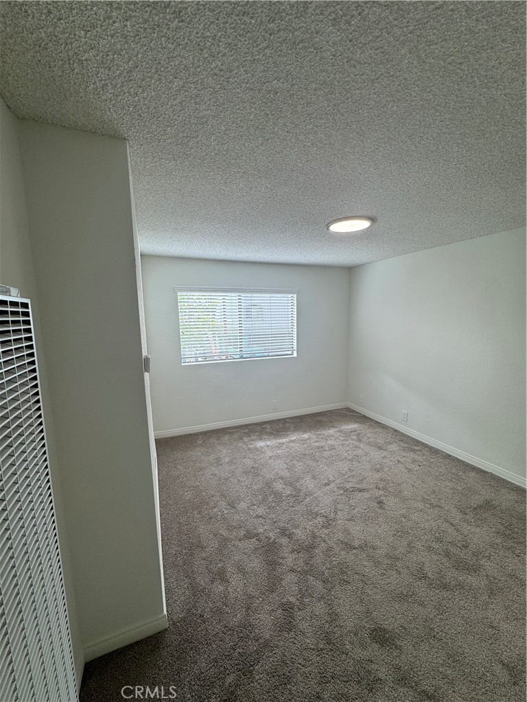 216 Sheldon Street, Unit 1 El Segundo, CA 90245 - Photo 13 of 16 an empty room with a window