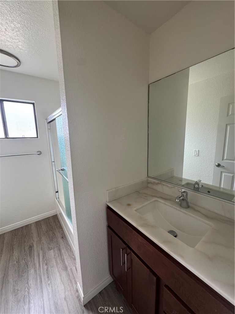 216 Sheldon Street, Unit 1 El Segundo, CA 90245 - Photo 16 of 16 a bathroom with a sink and a mirror