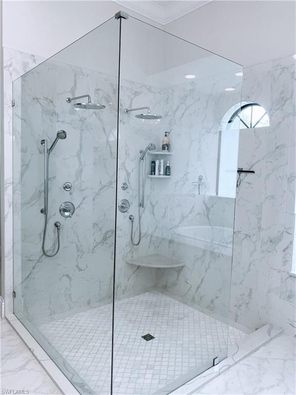 Undisclosed Address Naples, FL 34109 - Photo 17 of 33 a bathroom with a shower