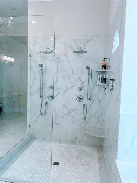 Undisclosed Address Naples, FL 34109 - Photo 18 of 33 a bathroom with a shower