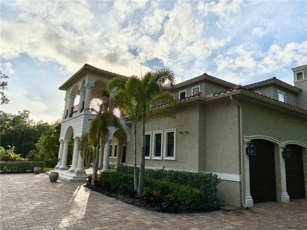 Undisclosed Address Naples, FL 34109 - Photo 4 of 33 a front view of a house