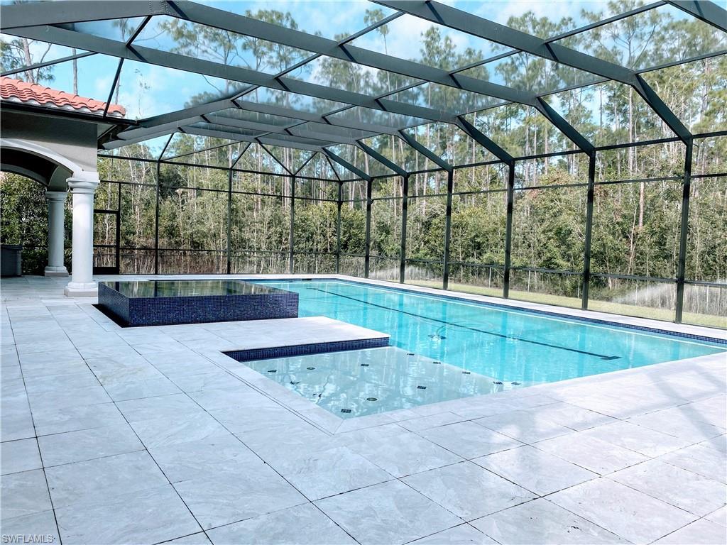 Undisclosed Address Naples, FL 34109 - Photo 7 of 33 a view of a indoor swimming pool