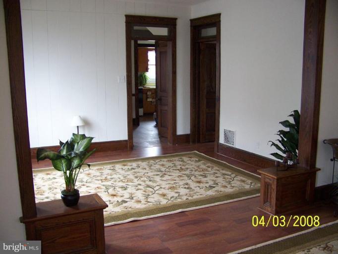 21414 York Road Freeland, MD 21053 - Photo 3 of 4 a view of a hallway to dining room and wooden floor
