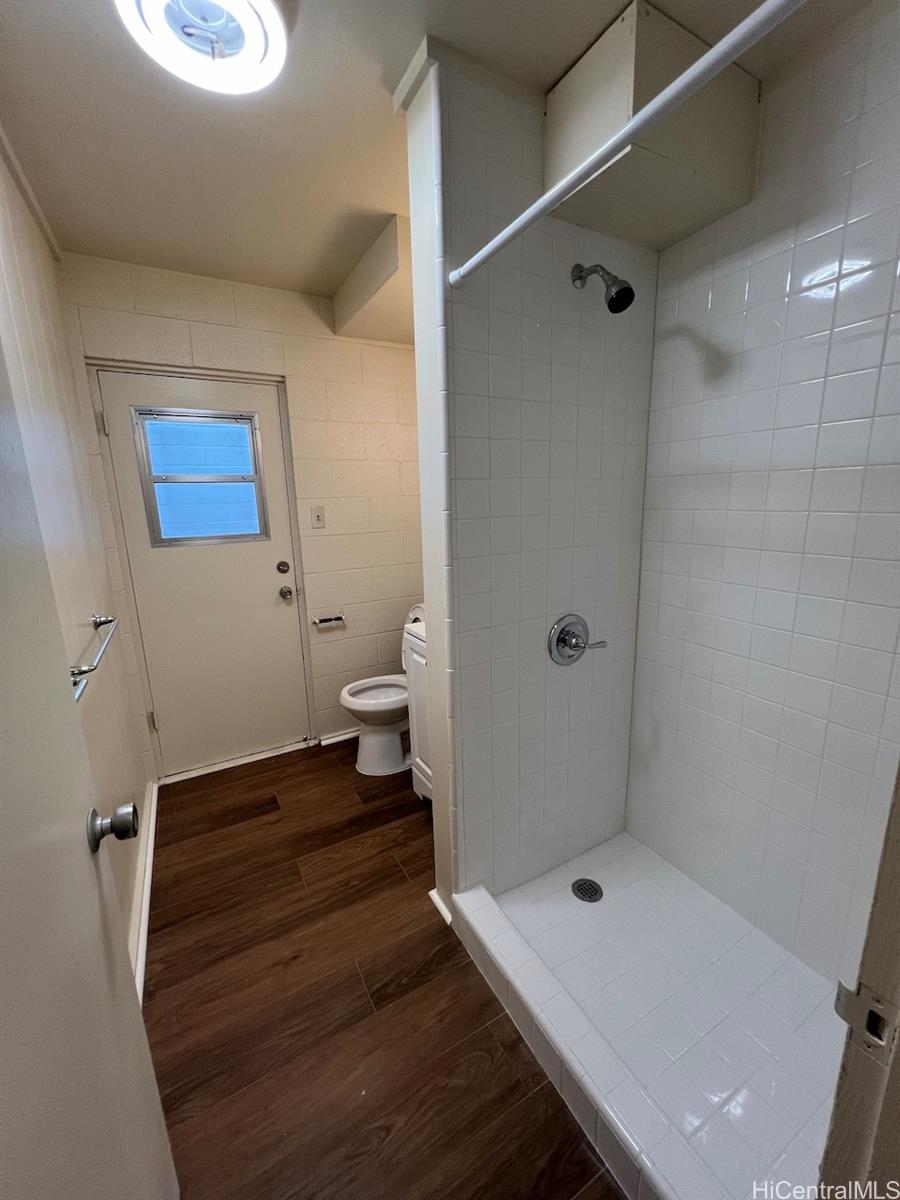 1920 Young Street, Unit 6 Honolulu, HI 96826 - Photo 6 of 8 a bathroom with a toilet and a shower
