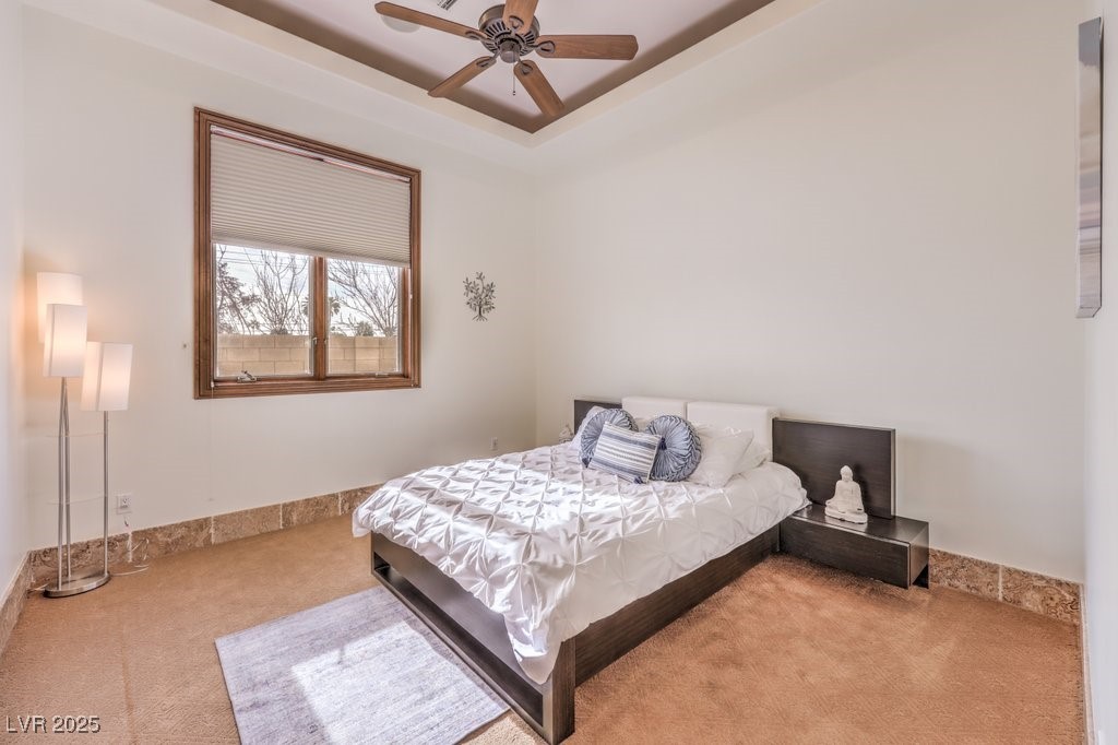 2780 El Camino Road Las Vegas, NV 89146 - Photo 50 of 90 Bedroom with carpet floors and a ceiling fan