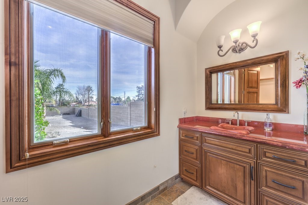 2780 El Camino Road Las Vegas, NV 89146 - Photo 57 of 90 Bathroom with baseboards and vanity