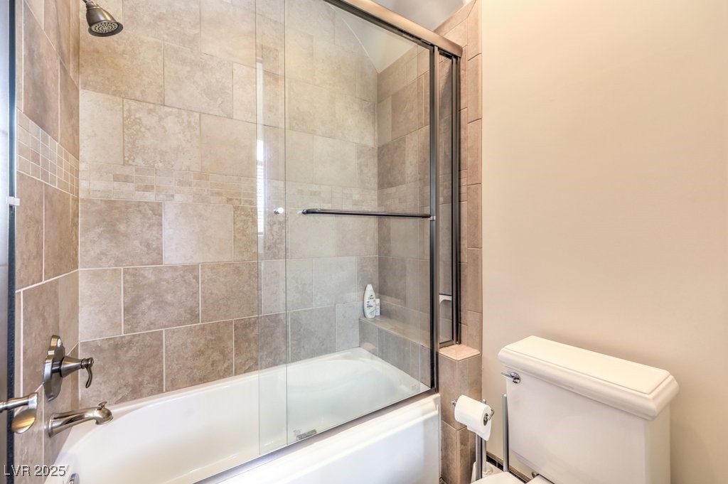 2780 El Camino Road Las Vegas, NV 89146 - Photo 75 of 90 Full bath with toilet and shower / bath combination with glass door