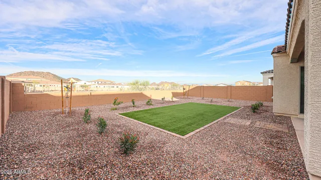 a view of a street with a building in the background