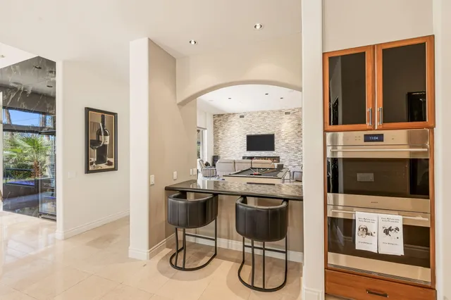 a view of a livingroom with furniture and window