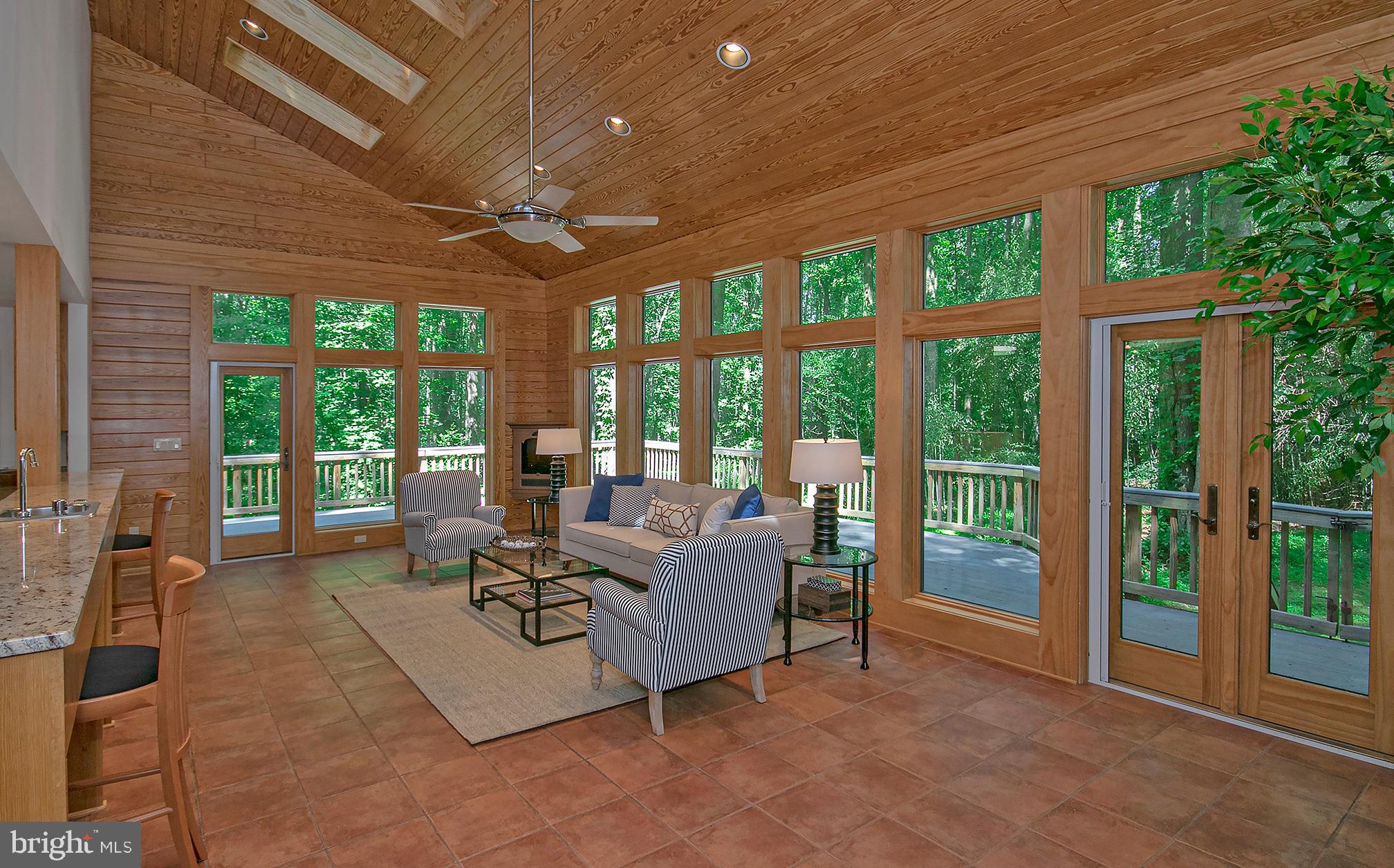 634 Springvale Road Great Falls, VA 22066 - Photo 16 of 37 Family Room with breakfast bar