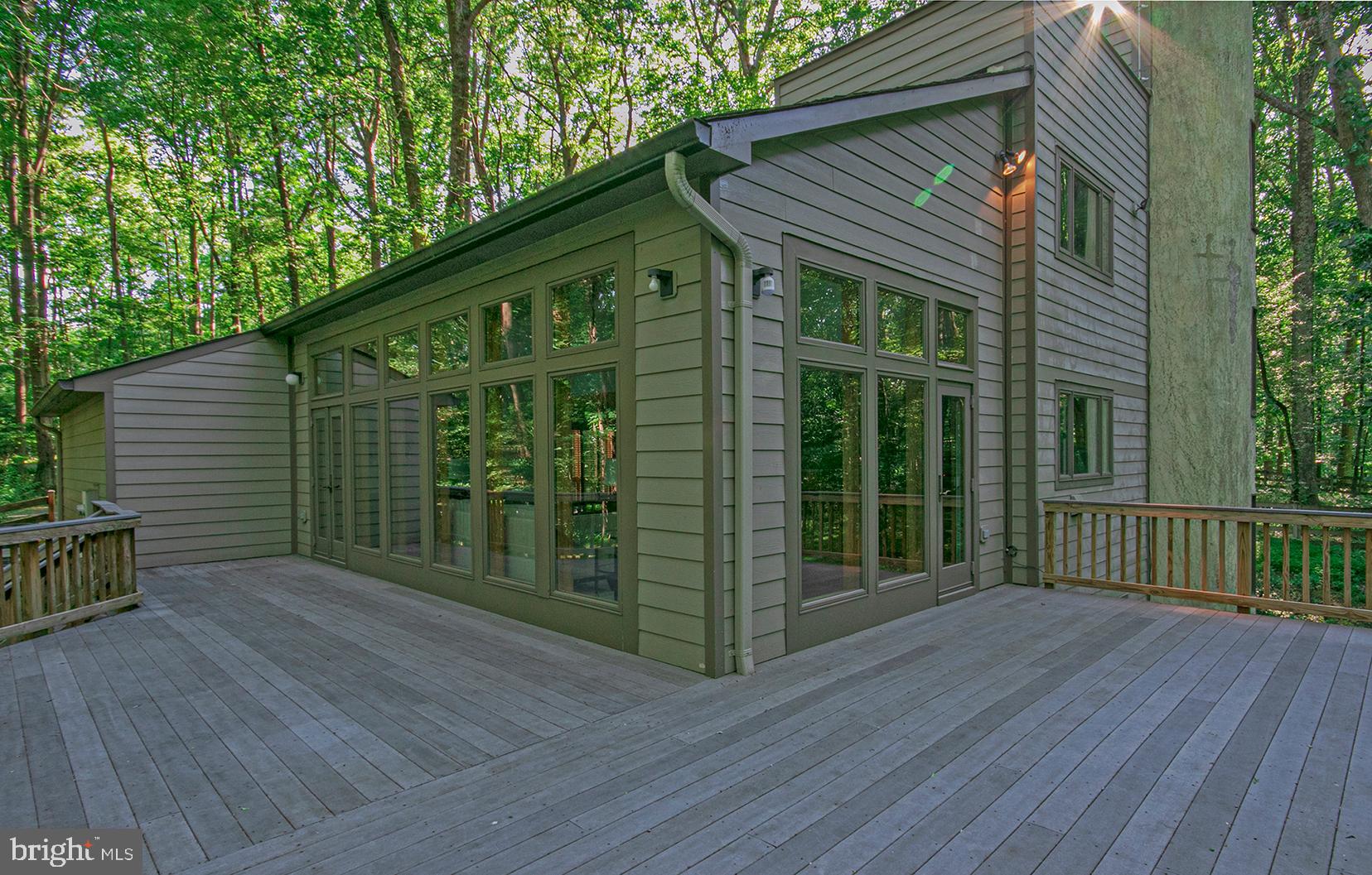 634 Springvale Road Great Falls, VA 22066 - Photo 18 of 37 Wrap around deck off family room