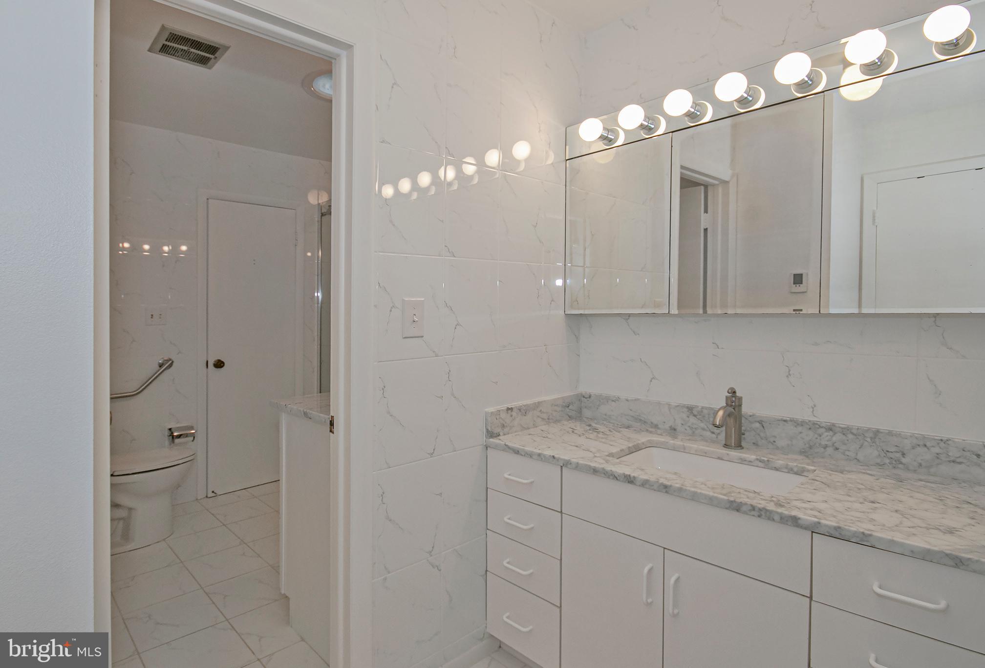 634 Springvale Road Great Falls, VA 22066 - Photo 32 of 37 Upper Level Bath Second vanity