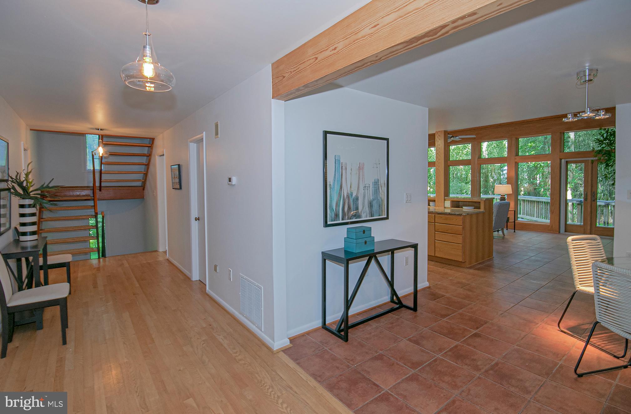 634 Springvale Road Great Falls, VA 22066 - Photo 8 of 37 View from hall to kitchen/family room