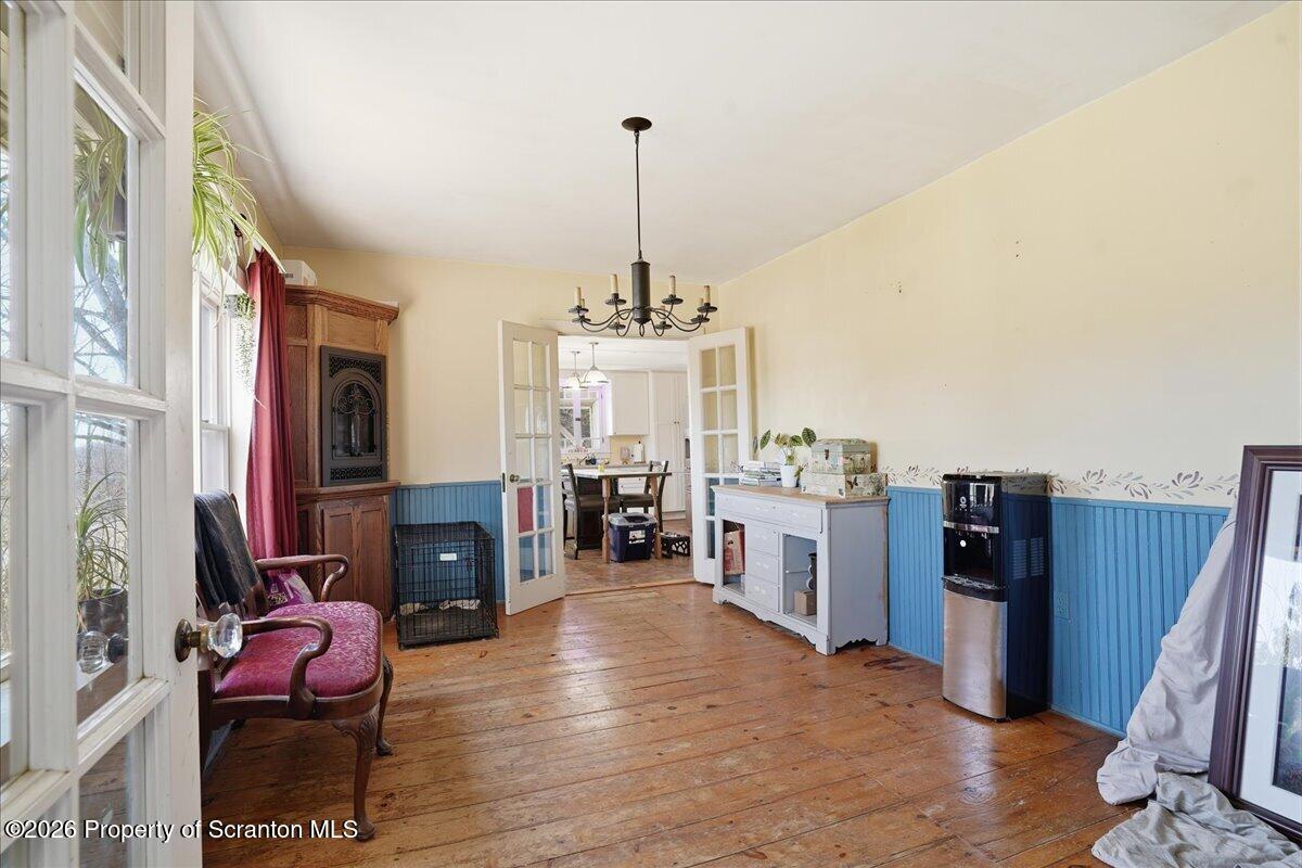 519 Sutton Road New Milford, PA 18834 - Photo 11 of 80 a dining room with furniture and wooden floor