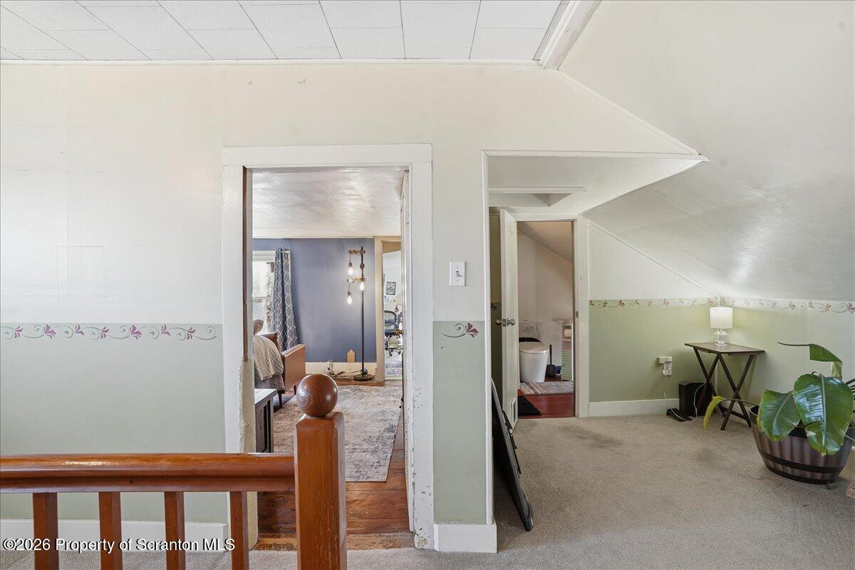 519 Sutton Road New Milford, PA 18834 - Photo 32 of 80 a view of a hallway with livingroom and furniture