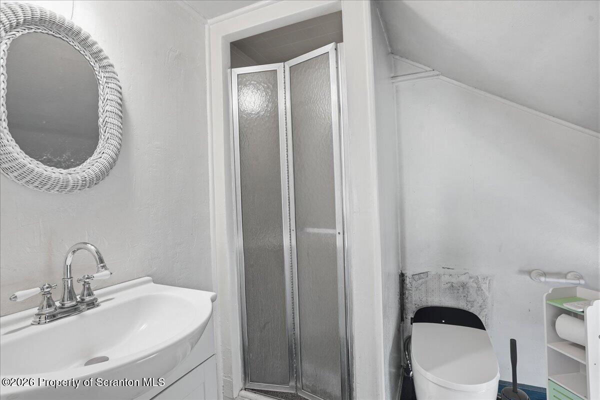 519 Sutton Road New Milford, PA 18834 - Photo 39 of 80 a bathroom with a toilet and a sink