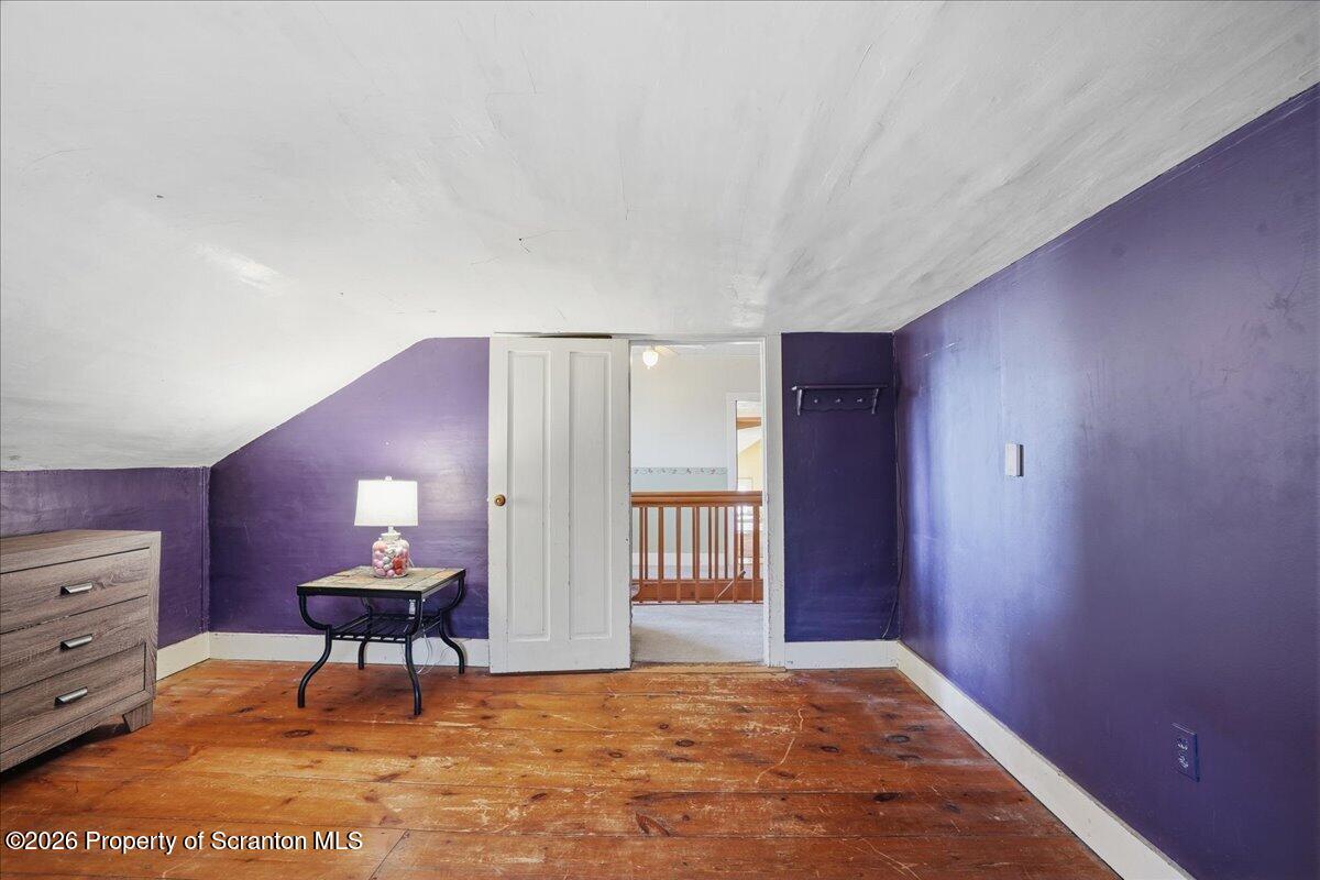 519 Sutton Road New Milford, PA 18834 - Photo 42 of 80 a view of a livingroom with furniture and wooden floor