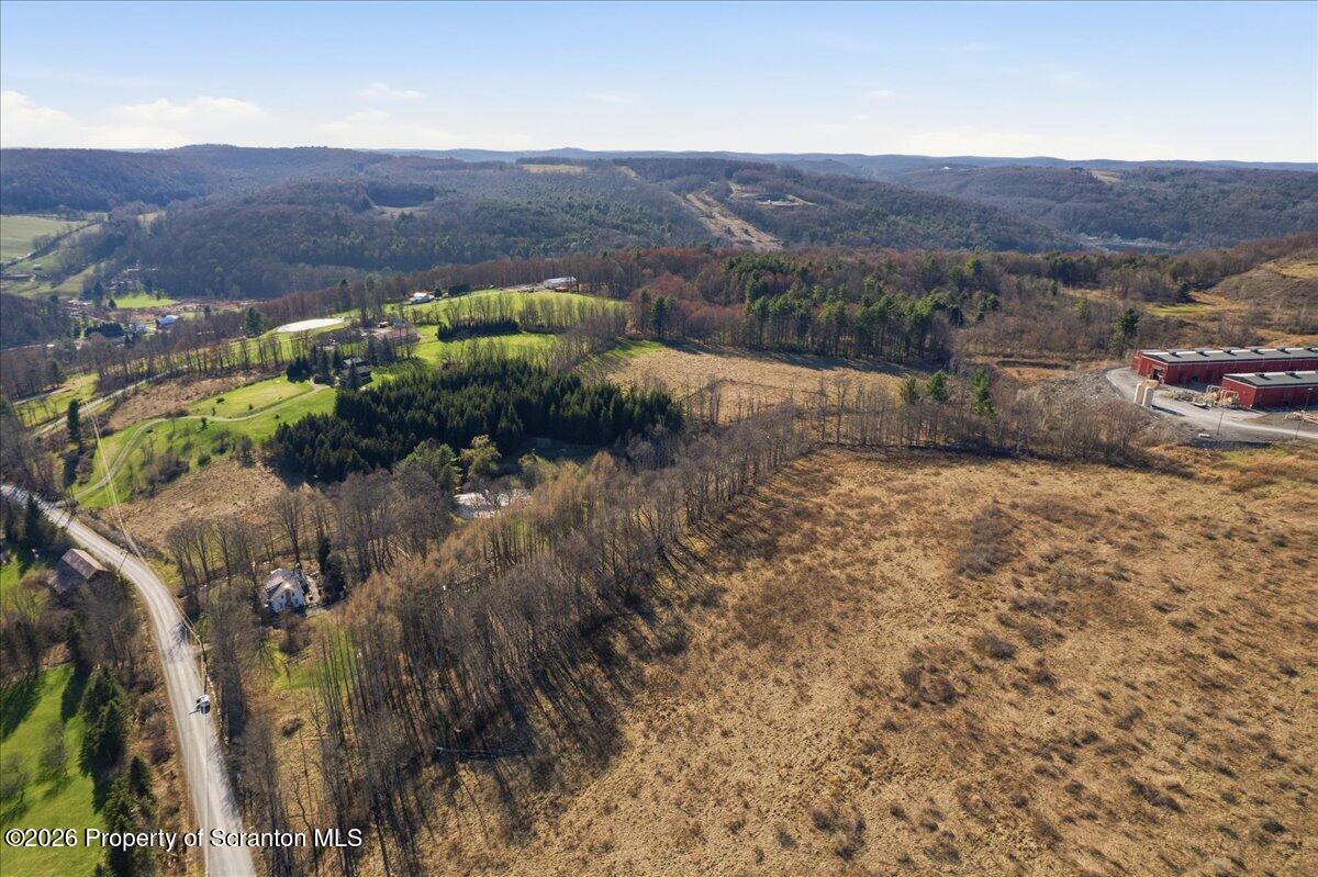 519 Sutton Road New Milford, PA 18834 - Photo 63 of 80 a view of a bunch of trees and mountains