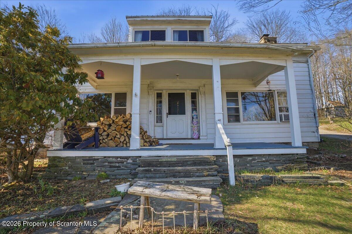 519 Sutton Road New Milford, PA 18834 - Photo 7 of 80 a view of a house with a yard