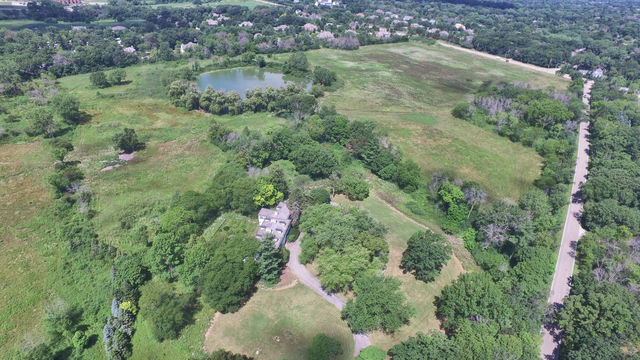 210 South Ridge Road Lake Forest, IL 60045 - Photo 1 of 22 an aerial view of residential houses with outdoor space and trees