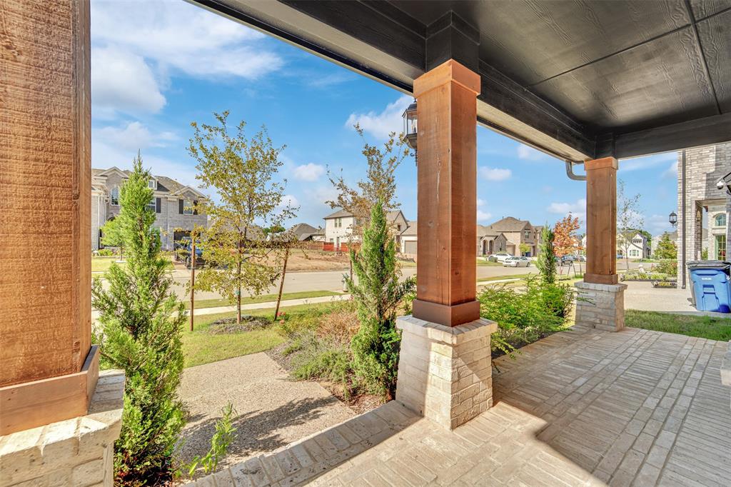 3520 Helios Lane Corinth, TX 76208 - Photo 4 of 37 Covered front porch featuring wood-finish columns with stone bases