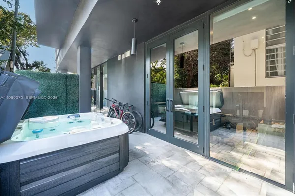 a bathroom with a sink double vanity and a mirror