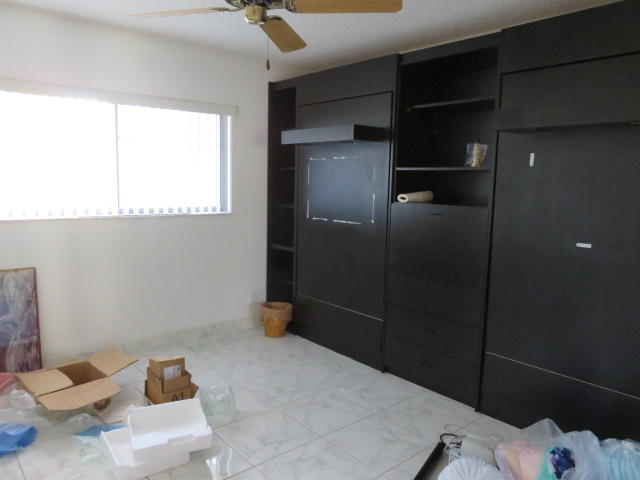 15075 Witney Road, Unit 214 Delray Beach, FL 33484 - Photo 11 of 18 2nd bedroom w/ twin Murphy beds