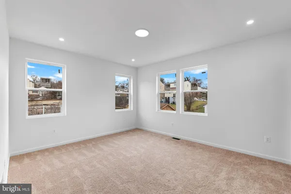 an empty room with windows