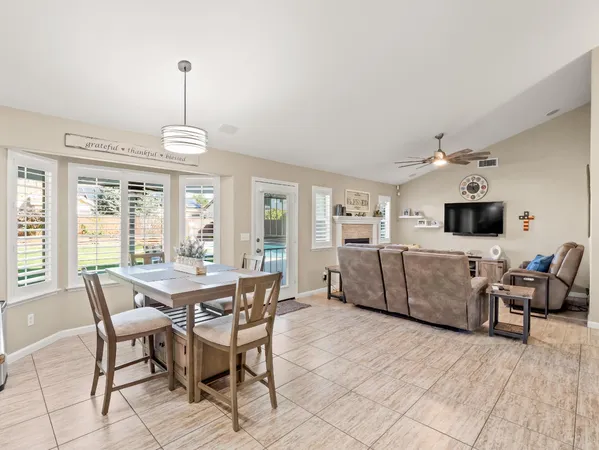 a view of a livingroom with furniture and window