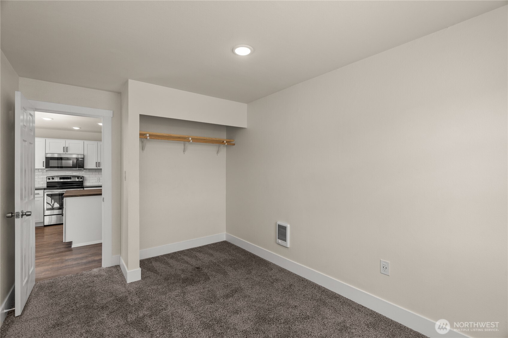 2736 Riverview Drive Aberdeen, WA 98520 - Photo 17 of 40 a view of a kitchen with a refrigerator and a stove