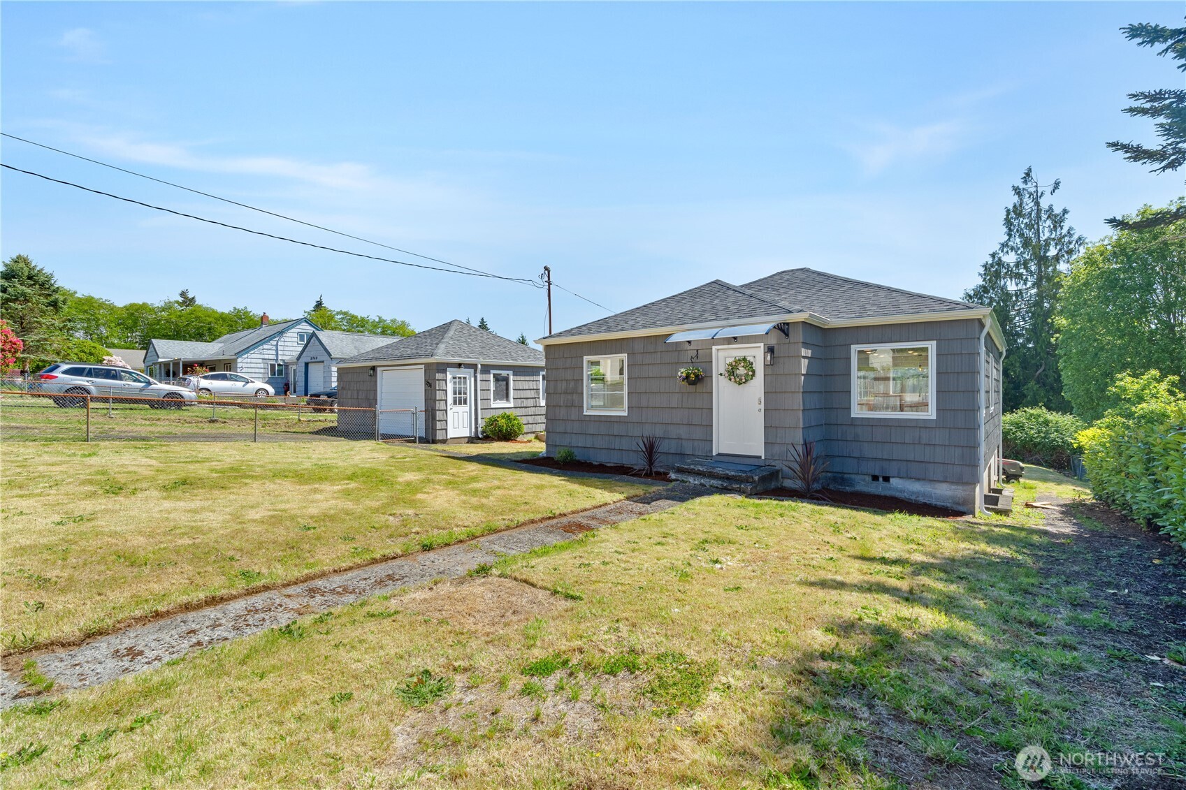 2736 Riverview Drive Aberdeen, WA 98520 - Photo 2 of 40 a view of a house with swimming pool and a yard
