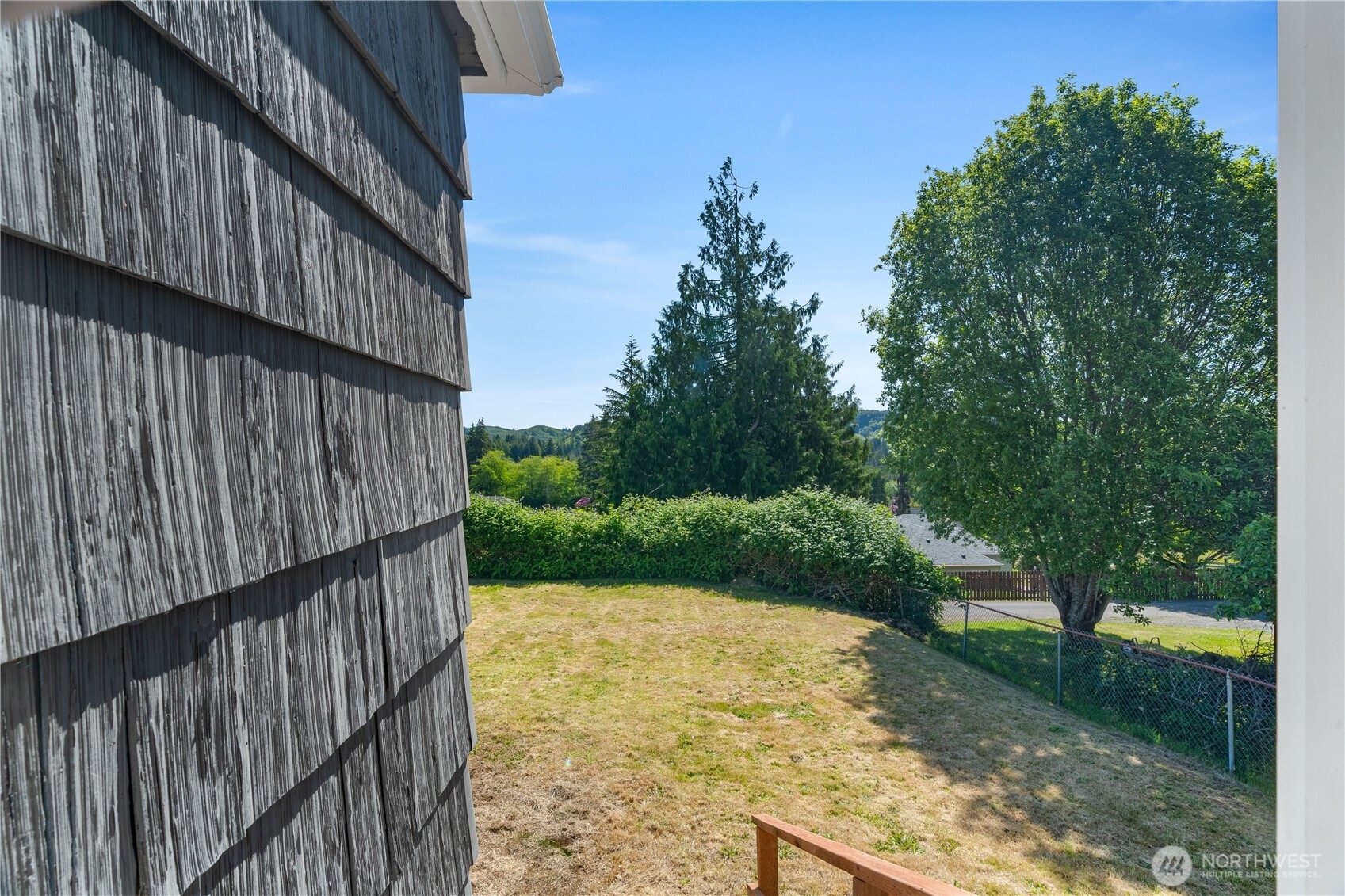 2736 Riverview Drive Aberdeen, WA 98520 - Photo 29 of 40 a view of a house with a yard