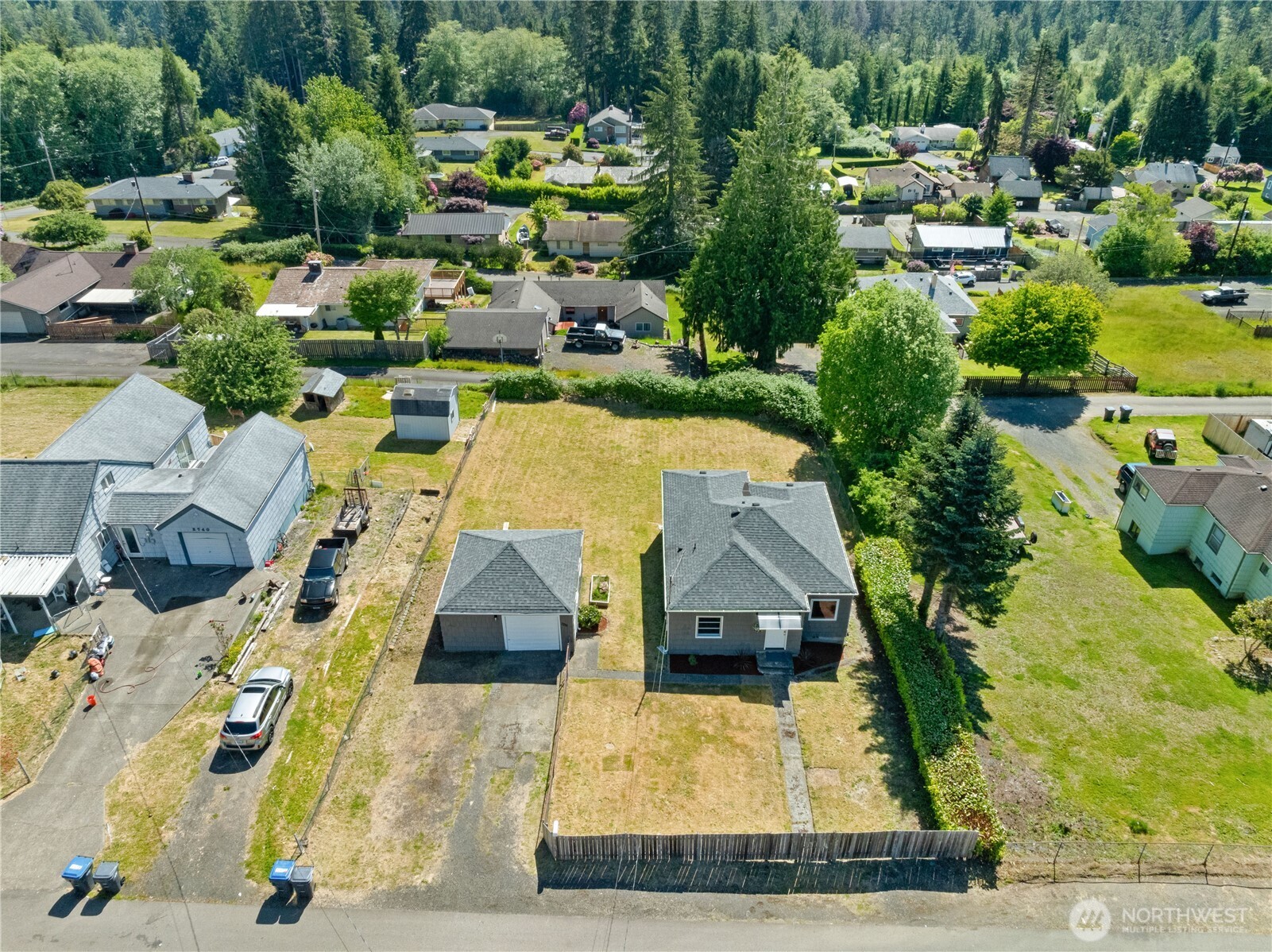 2736 Riverview Drive Aberdeen, WA 98520 - Photo 33 of 40 an aerial view of a house with swimming pool and lake view