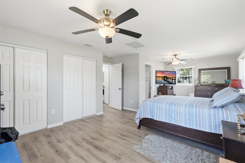 270 Wright Grove Road Oak Hill, FL 32759 - Photo 17 of 17 a bedroom with bed and window