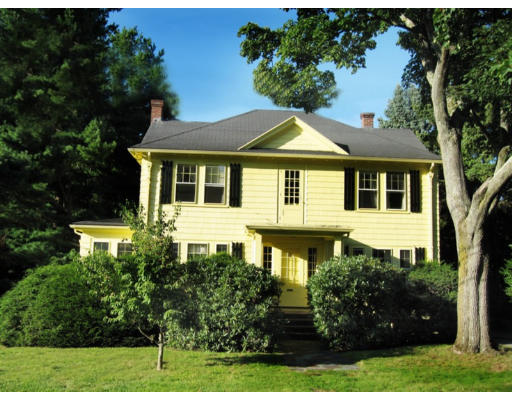 6 Perkins Road Winchester, MA 01890 - Photo 1 of 13 a front view of a house with a yard
