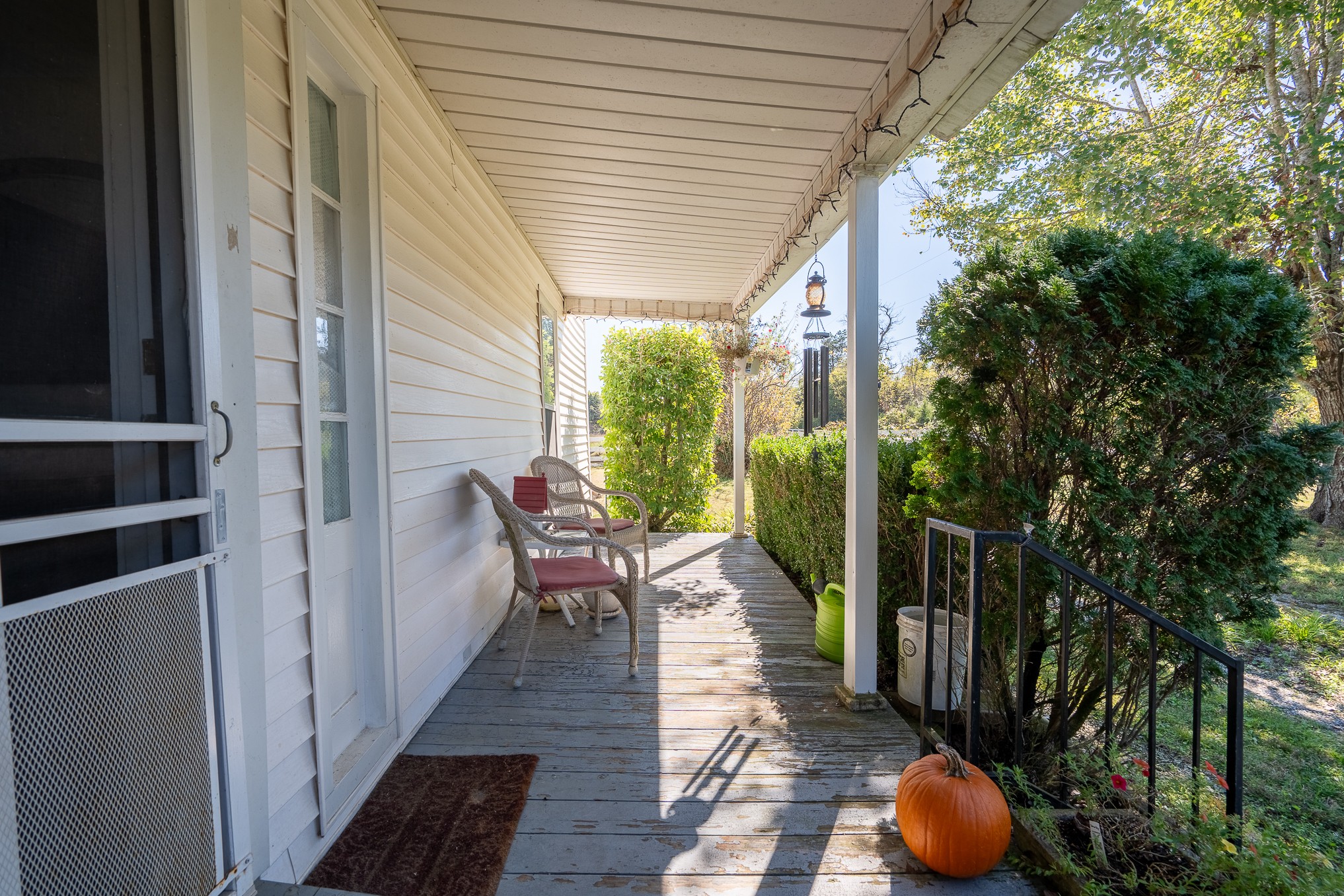 116 Ashland Road Waynesboro, TN 38485 - Photo 11 of 59 a view of a balcony with chairs and a table