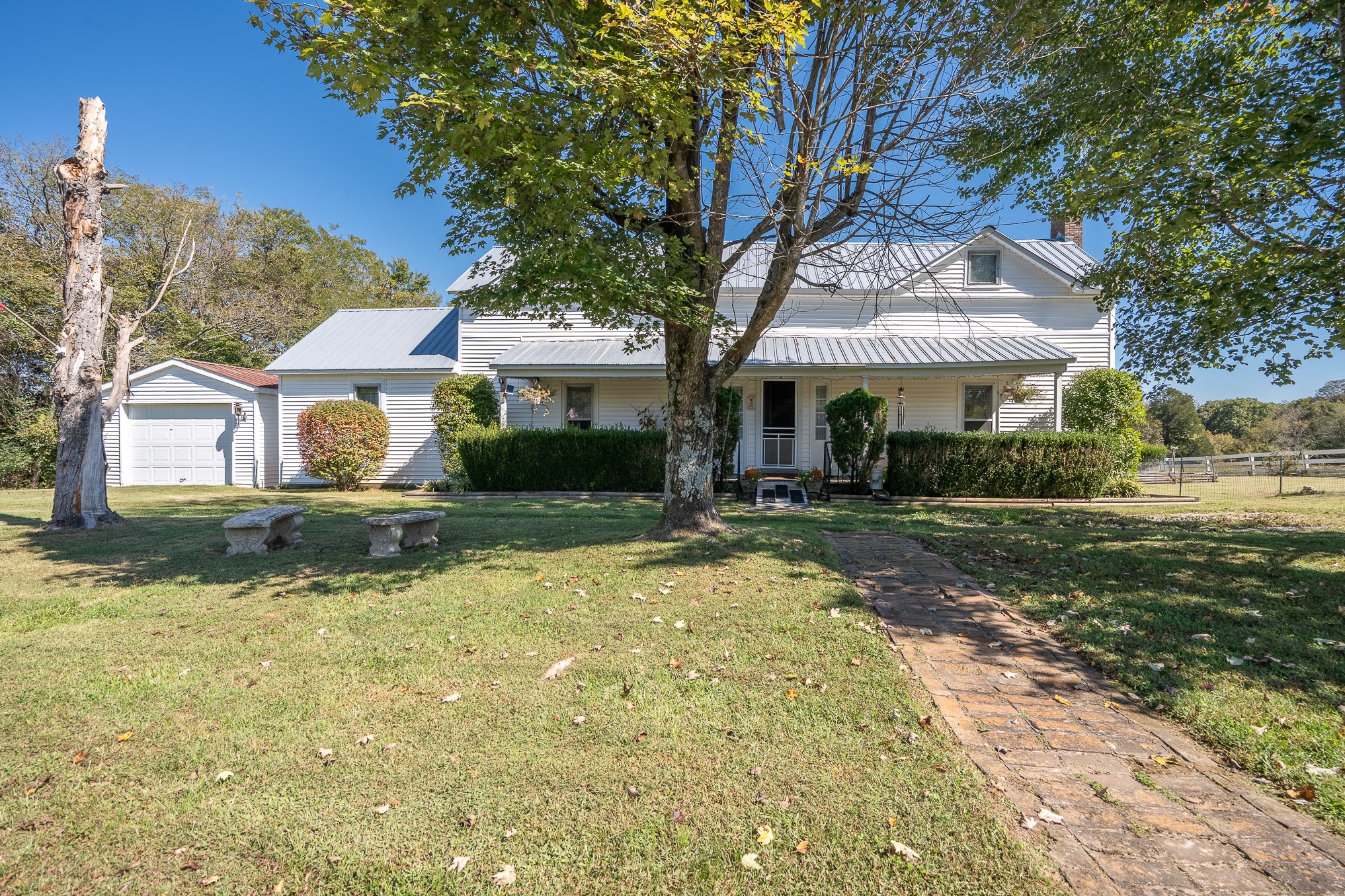 116 Ashland Road Waynesboro, TN 38485 - Photo 2 of 59 a front view of a house with a yard
