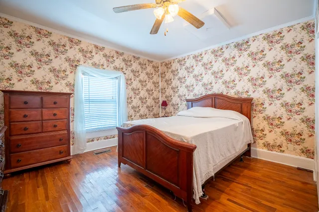 a bedroom with a bed and a walk in closet