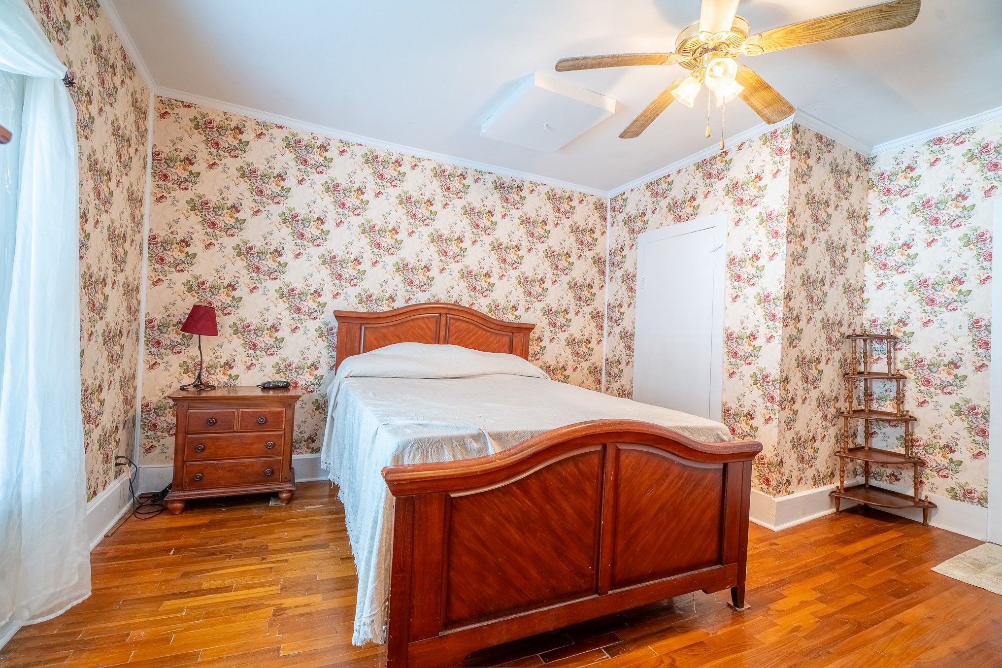 116 Ashland Road Waynesboro, TN 38485 - Photo 26 of 59 a bedroom with a bed and a walk in closet