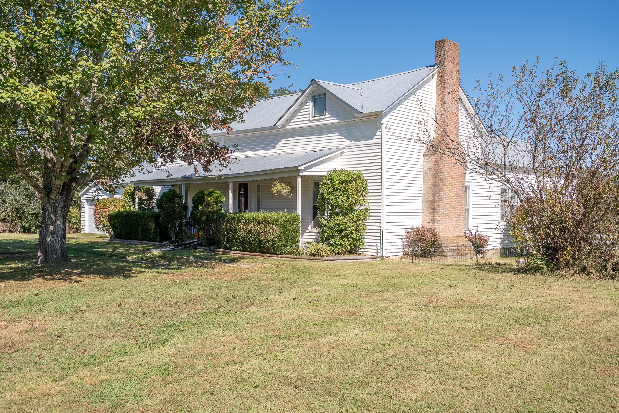 116 Ashland Road Waynesboro, TN 38485 - Photo 4 of 59 a view of a house with a yard and large tree