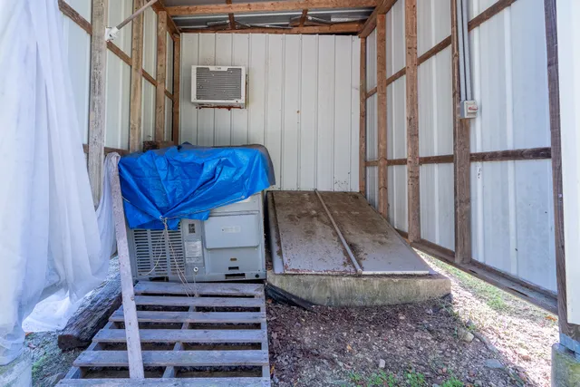 a view of a balcony with chairs and a table