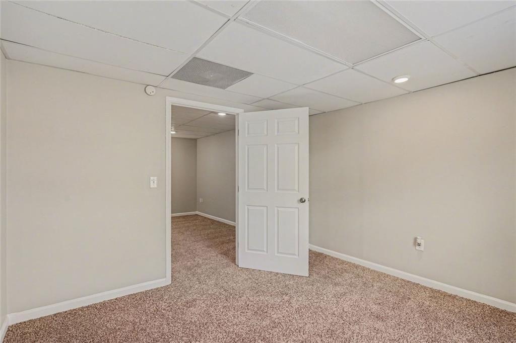 10 Wilbur Way Covington, GA 30016 - Photo 19 of 22 an empty room with an entryway