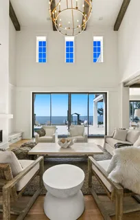 a white bath tub sitting next to a white sink