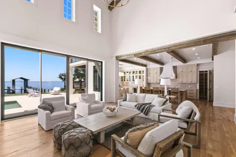 a view of a living room and wooden floor