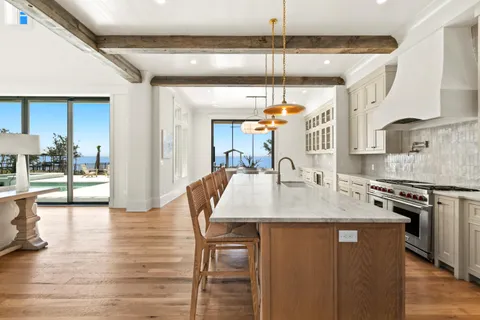 a view of a swimming pool with an outdoor seating