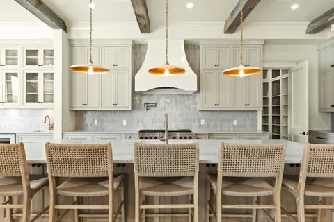 a bathroom with a granite countertop shower a mirror and a sink