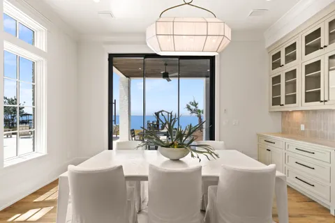 a view of a kitchen with a sink and a window