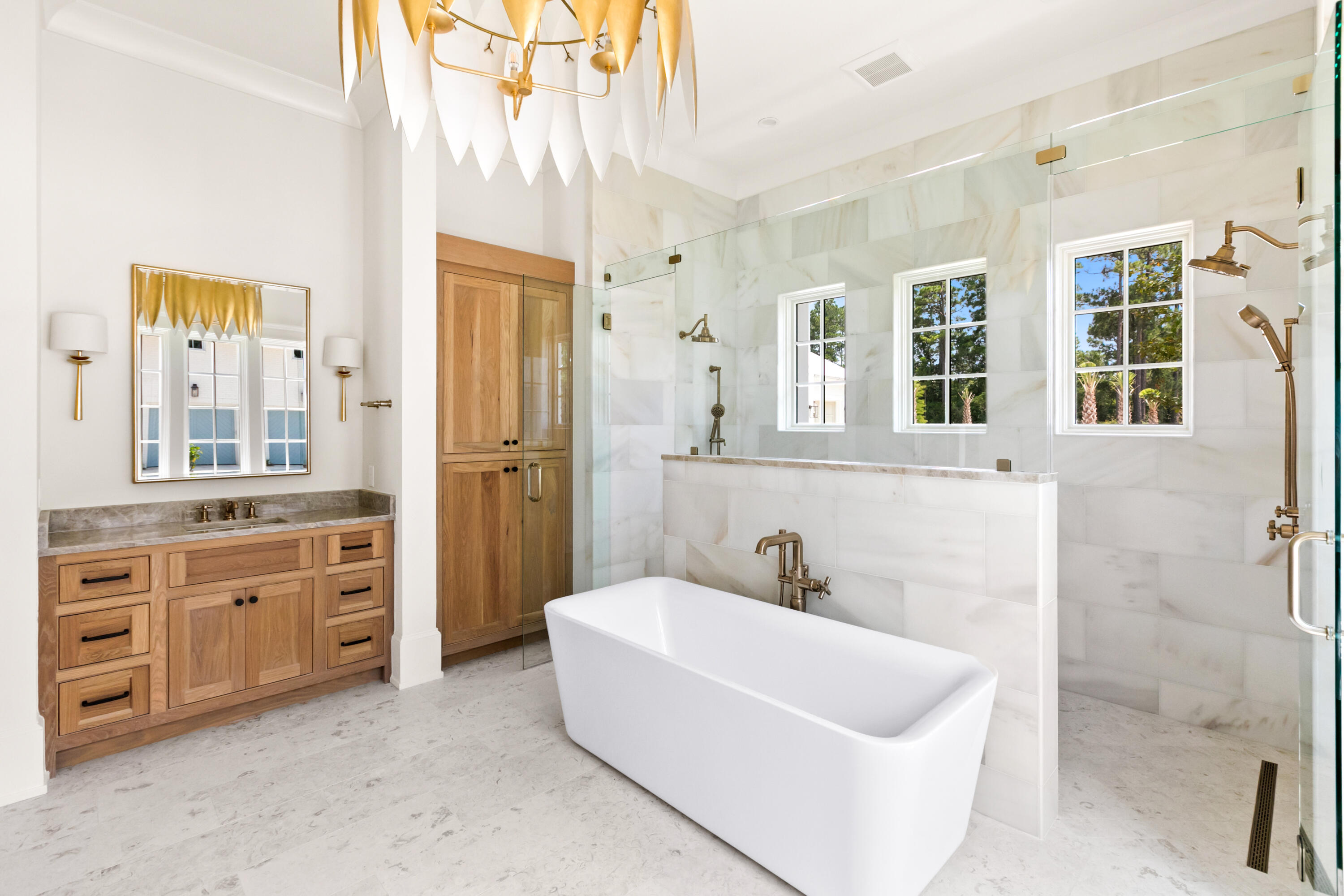 22 Carolyn Lane Santa Rosa Beach, FL 32459 - Photo 47 of 108 a bathroom with a tub sink and mirror