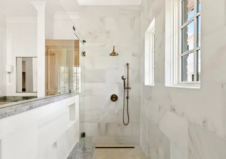 a front view of residential houses with yard