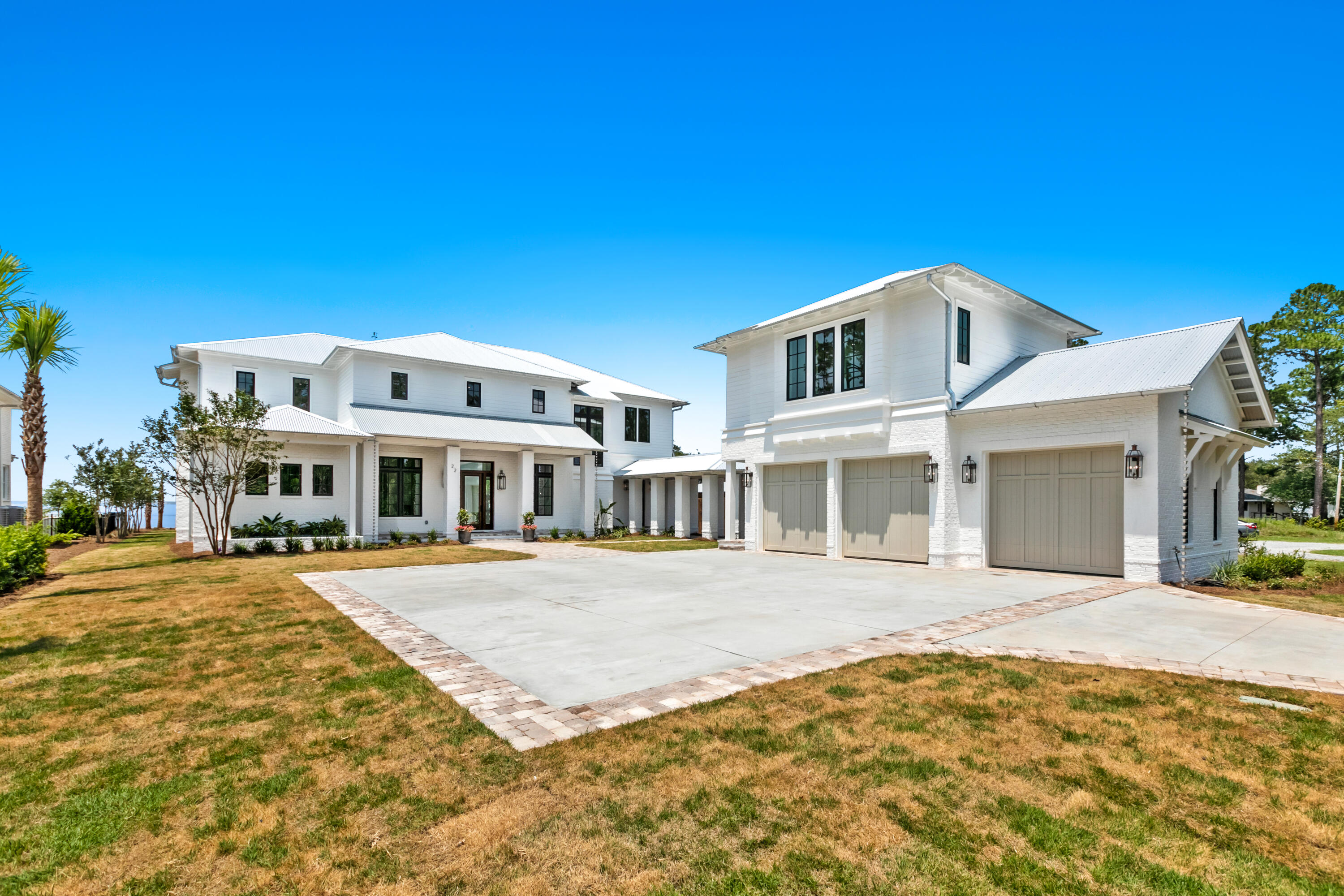 22 Carolyn Lane Santa Rosa Beach, FL 32459 - Photo 9 of 108 a front view of a house with a yard